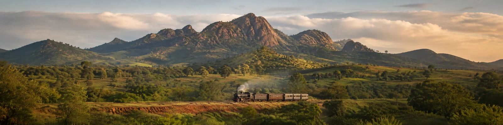 Paisaje montañoso de Paraguay con un tren histórico
